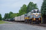 PO-74 pulls a cut of cars out of the siding at Tobyhanna